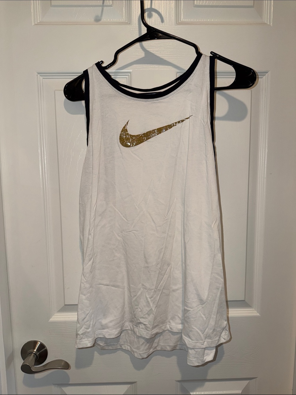 Nike Women’s White Tank with Gold Swoosh Accents